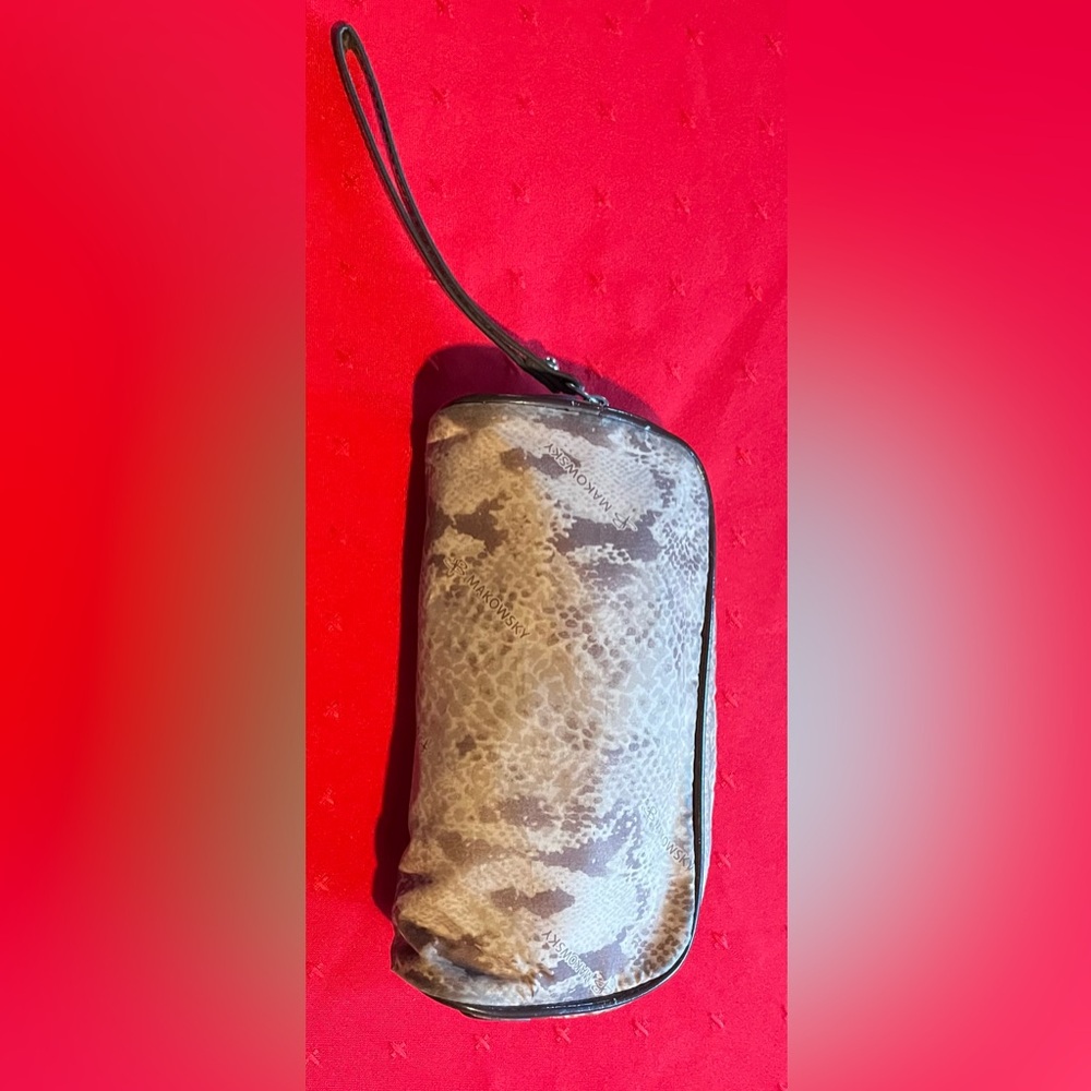 B. Makowsky Snakeskin Pattern Wristlet